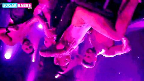 Blonde babe spreads legs wide as muscular studs finger her wet pussy in neon club orgy