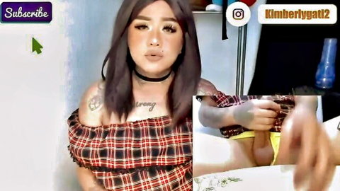 Asian woman masturbating live in plaid off-shoulder top, yellow panties aside exposing pussy