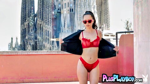 Petite Asian babe in red lace lingerie posing seductively on rooftop with Sagrada Familia