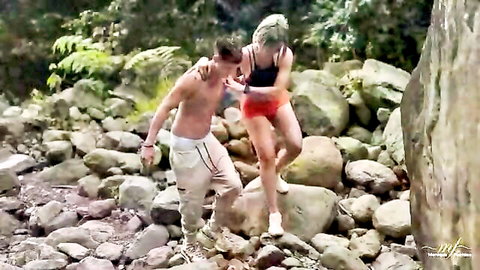 Monique Fuentes and stepson Danner Mendez playful embrace at sea