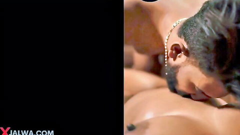Bearded South Asian man in ecstasy with face buried between juicy tits and curvy bodies