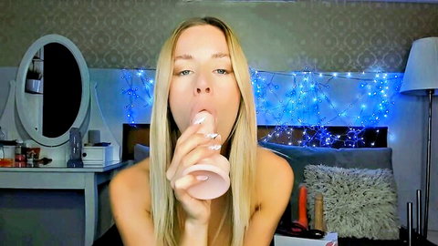 Miabeex blonde topless cam girl sucking pink dildo in bedroom