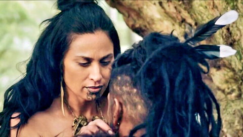Kali Kopae topless in intimate tribal embrace, nude tits scene from The Dead Lands