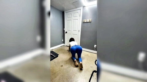 Sexy trans CD bending over in tight blue jeans, showcasing massive ass and curves