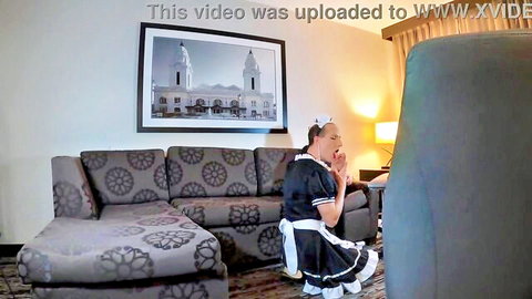 Sissy maid in French maid outfit kneels in worship pose for headmistress feet