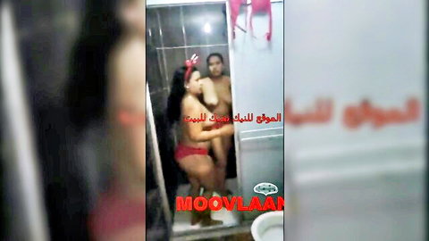 Two busty Arab women in steamy shower embrace, amateur tease
