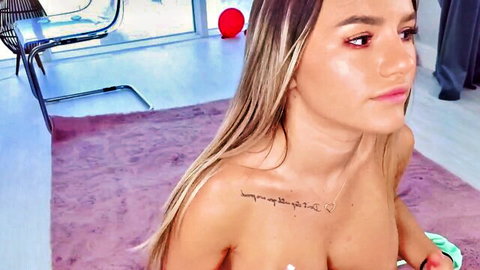 AudreyRyen topless blonde cam girl with shoulder tattoo on MyFreeCams