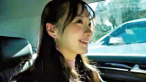 Nagisa Ren smiling in car during obedient hot spring trip JAV