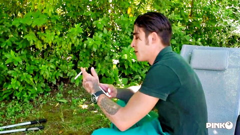 Tattooed man smoking outdoors in green shirt, horny GILF fuck scene