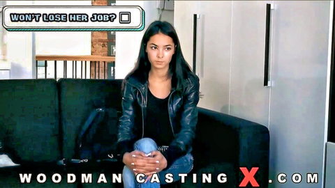 Young Latina in leather jacket on casting couch, worried about job