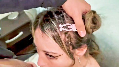 Blonde woman gripped by hand in hair during lustful XXX scene