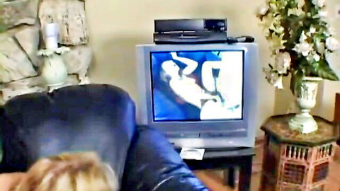 Blonde Angela Stone in nude explicit pose on screen, rough face fucking scene