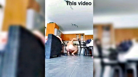 Amateur solo woman squatting nude, showing bare ass from behind