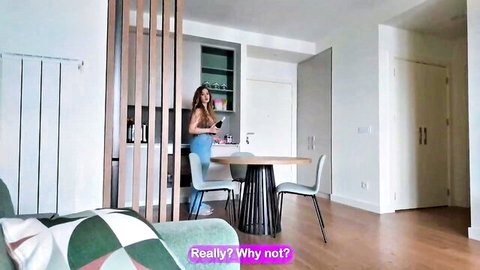 Busty brunette in blue dress teases in modern kitchen, large tits ready for friend sex