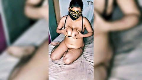 Alisha Indian Bhabhi exposes jiggly big breasts in black lingerie mask
