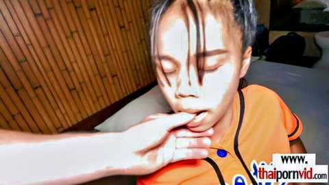 Thai teen girl submissive with hand gripping her mouth