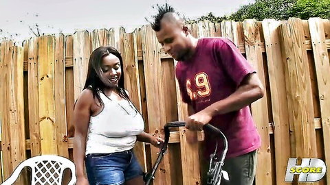 Ebony plumper Ginger Milf big boobs with black stud outdoors