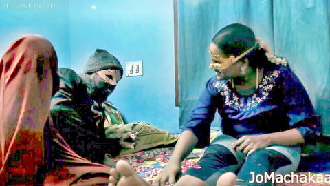 Naughty Indian woman in blue top teases clothed men with bare feet in foreplay
