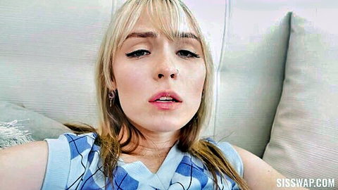 Blonde Lilly Bell teasing with cleavage in blue checkered top