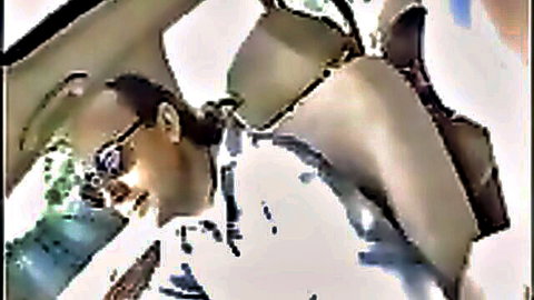 British amateur guy with glasses smiling in car seat for solo tease