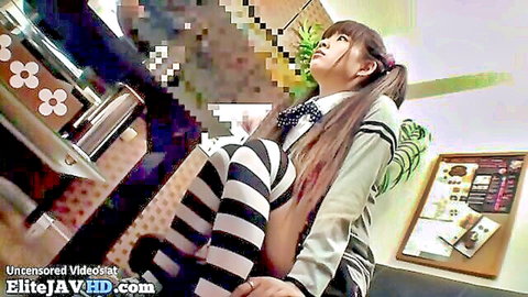 Japanese schoolgirl spreads legs wide exposing shaved wet pussy on classroom desk