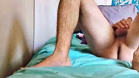 Amateur couple in explicit anal penetration, legs spread wide