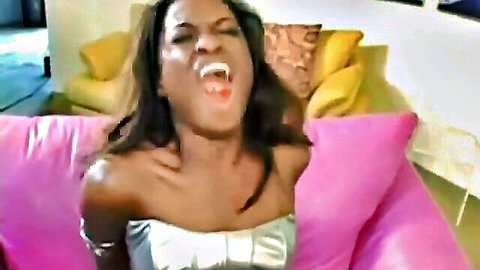 Ebony Monique intense moan in shiny silver dress, big tits cleavage