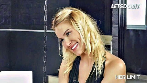 Blonde stunner Cherry Kiss smiling seductively in black dress for intense anal BBC scene