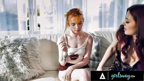 Redhead Madi Collins in tank top bonding with brunette MILF on couch