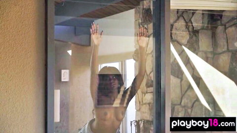 Steamy ebony 18yo presses nude body against window, revealing black snatch