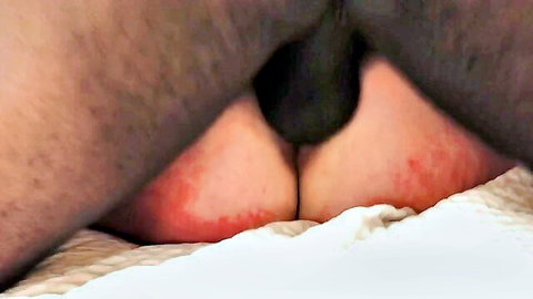 Thick black cock penetrating tight pink asshole between spanked red big ass cheeks