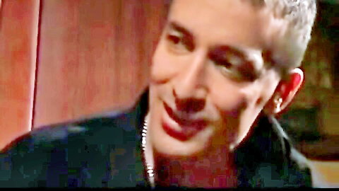 Lora Craft, handsome male model smiling in dark jacket necklace