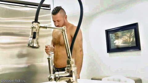 Muscular shirtless man holding wine glass in teasing pose, from Raw & Waiting with Cara Danvers
