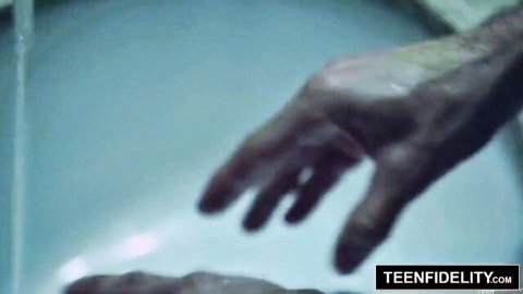 Elena Koshka's hand reaching in steamy blue scene, Teenfidelity
