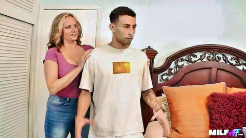 Nina Starr blonde MILF seducing young stud in steamy bedroom encounter