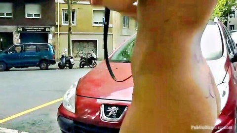 Venezuelan big tit hottie topless on leash in public, obedient slave