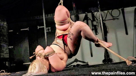 Blonde submissive Kitten in upside-down suspension bondage and whipping, amateur BDSM