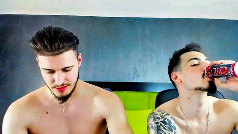 Billymontez gay duo muscular bearded men shirtless drinking energy drink