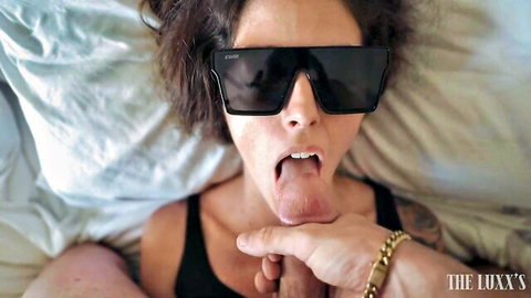 POV brunette with sunglasses sticks out tongue for deepthroat cumshot