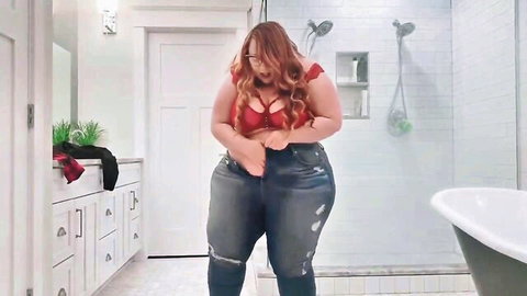 Curvy SSBBW redhead MILF grabs her huge tits in red ruffle bra and ripped jeans teasing in bathroom