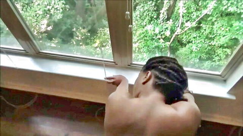 Curvy ebony model BuxxomRose nude back view leaning out window