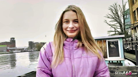 Naomi Love smiling outdoors in pink jacket, German Scout casting