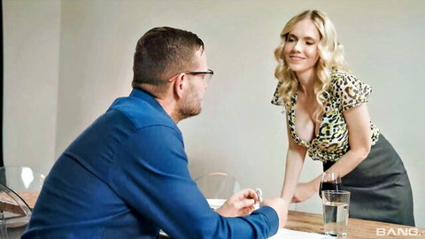 Rebel Rhyder in leopard blouse and skirt, teasing man at table