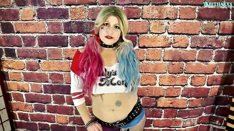Blonde MILF in sexy Harley Quinn cosplay, seductive pose with fishnets and cropped top