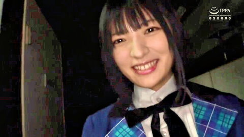 Innocent Yumi Nijimura in schoolgirl uniform smiling playfully