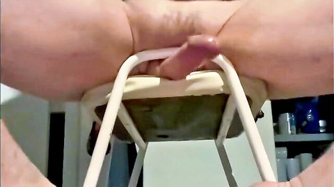 Woman in sundress with dildo inserted in vagina, close-up indoor solo play