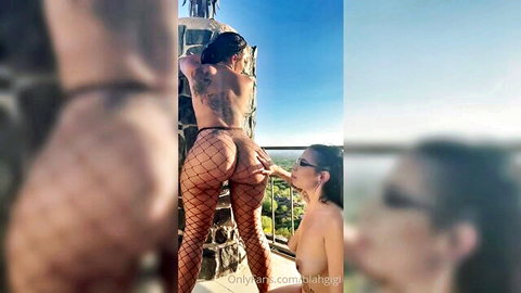 Taeler and Gigi in fishnet lingerie, outdoor lesbian ass play
