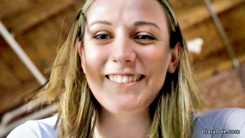 Smiling blonde amateur girlfriend takes closeup POV selfie in white top