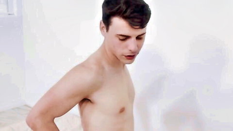 Young athletic Caucasian man shirtless in solo pose from Bottom Games 9
