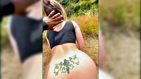 Blonde with slut tramp stamp tattoo, big ass exposed outdoors, hair grabbed